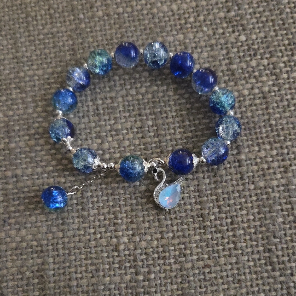 Elegant Blue Beaded Bracelet with Swan Charm